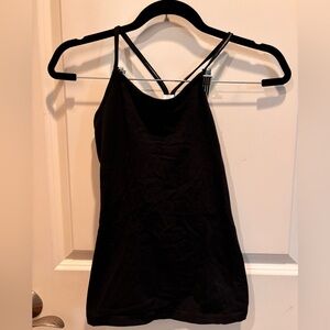 Girl’s Ivivva black racer back tank top with built in sports bra.